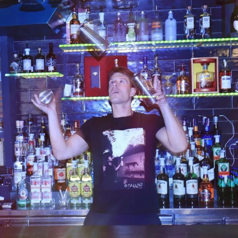 club seven bartender juggling glasses